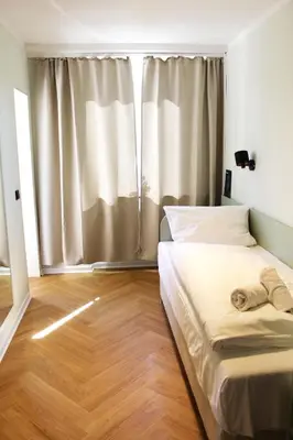 Ein Bett oder Betten in einem Zimmer der Unterkunft Autobahn Hotel Pfungstadt Ost