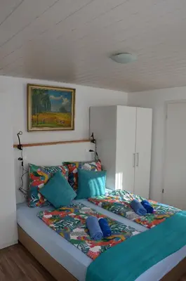 Ein Bett oder Betten in einem Zimmer der Unterkunft Gasthaus Löwen