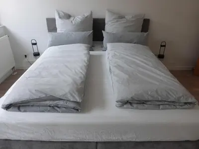 Ein Bett oder Betten in einem Zimmer der Unterkunft Ferienwohnungen an der Kimbach