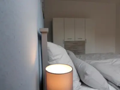 Ein Bett oder Betten in einem Zimmer der Unterkunft Ferienwohnungen an der Kimbach