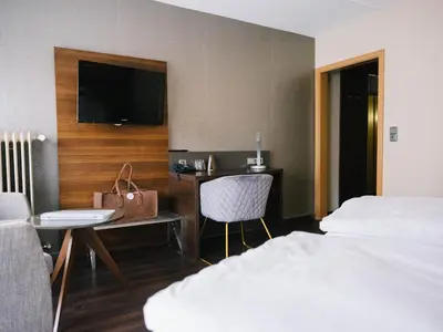 Ein Bett oder Betten in einem Zimmer der Unterkunft hotel zentlinde