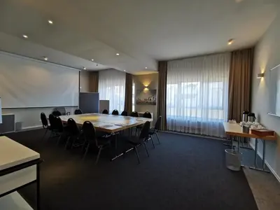 Der Geschäftsbereich oder Konferenzraum in der Unterkunft Hotel Gutsmühle