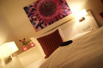 Ein Bett oder Betten in einem Zimmer der Unterkunft Hotel Jungstil