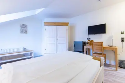 Ein Bett oder Betten in einem Zimmer der Unterkunft Hotel Blechhammer