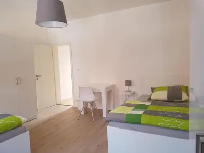 Ein Bett oder Betten in einem Zimmer der Unterkunft Quartier 
