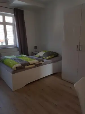 Ein Bett oder Betten in einem Zimmer der Unterkunft Quartier 
