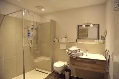 Ein Badezimmer in der Unterkunft Fronhof 3