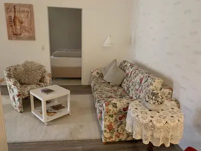Ein Sitzbereich in der Unterkunft Fronhof 3