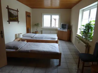 Ein Bett oder Betten in einem Zimmer der Unterkunft Ferienwohnung Wendt
