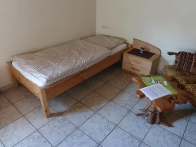Ein Bett oder Betten in einem Zimmer der Unterkunft Ferienwohnung Wendt