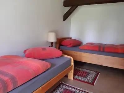 Ein Bett oder Betten in einem Zimmer der Unterkunft Ferienwohnung Stockemer Häcke