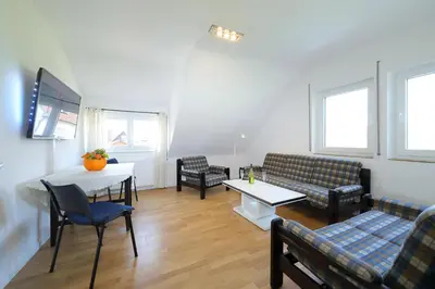 Ein Sitzbereich in der Unterkunft Ferienwohnung Biermann