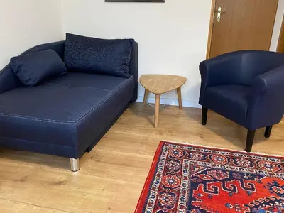 Ein Sitzbereich in der Unterkunft Hotel Janssen