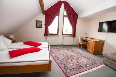 Ein Bett oder Betten in einem Zimmer der Unterkunft Hotel Janssen