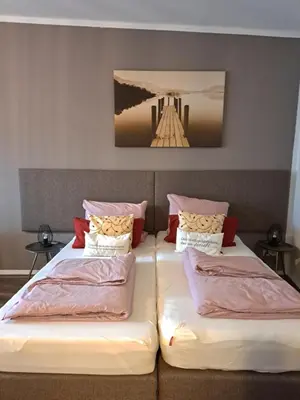 Ein Bett oder Betten in einem Zimmer der Unterkunft Aulbach' s Appartments