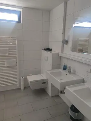 Ein Badezimmer in der Unterkunft Gästehaus Windheim (Karlsruhe-Knielingen 2)