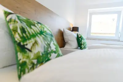 Ein Bett oder Betten in einem Zimmer der Unterkunft Zum Scheffelhof