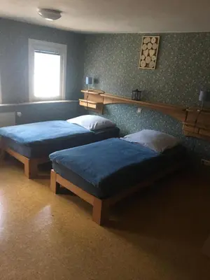 Ein Bett oder Betten in einem Zimmer der Unterkunft Ferienzimmer Saatmann