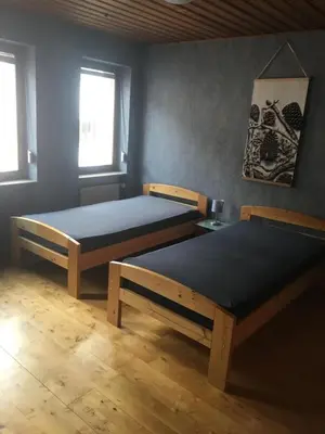 Ein Bett oder Betten in einem Zimmer der Unterkunft Ferienzimmer Saatmann