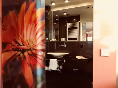 Ein Badezimmer in der Unterkunft Hotel TraumRaum - 