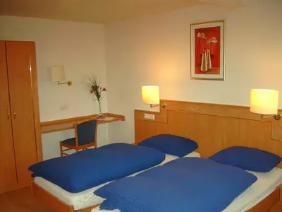 Ein Bett oder Betten in einem Zimmer der Unterkunft Hessisches Haus