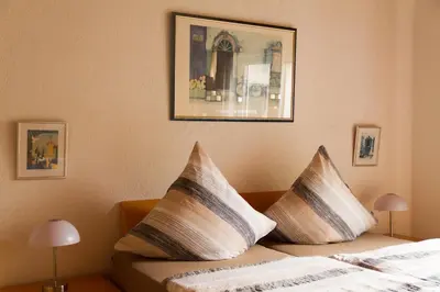 Ein Bett oder Betten in einem Zimmer der Unterkunft Apartment Muggensturm am Badesee
