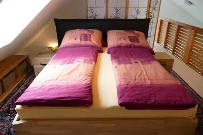 Ein Bett oder Betten in einem Zimmer der Unterkunft Otterhaus