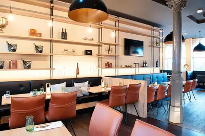 Ein Sitzbereich in der Unterkunft Welcome Hotel Neckarsulm