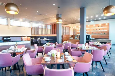 Ein Restaurant oder anderes Speiselokal in der Unterkunft Welcome Hotel Neckarsulm