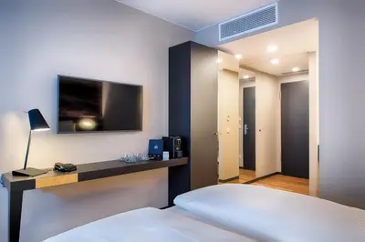 Ein Bett oder Betten in einem Zimmer der Unterkunft Welcome Hotel Neckarsulm