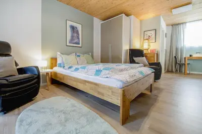 Ein Bett oder Betten in einem Zimmer der Unterkunft Erfblick-Apartments
