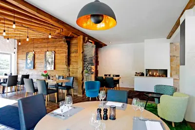 Ein Sitzbereich in der Unterkunft Hotel Restaurant Fronmühle 3 Sterne Superior