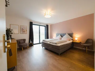 Ein Bett oder Betten in einem Zimmer der Unterkunft Gästehaus Frieda