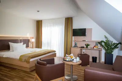 Ein Bett oder Betten in einem Zimmer der Unterkunft Hotel & Restaurant Goldener Pflug
