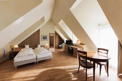 Ein Bett oder Betten in einem Zimmer der Unterkunft Kulturbrauerei Heidelberg