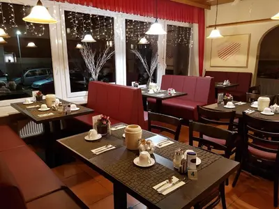 Ein Sitzbereich in der Unterkunft Hotel Zum Prinzen Sinsheim