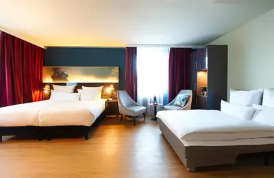 Ein Bett oder Betten in einem Zimmer der Unterkunft NYX Hotel Mannheim by Leonardo Hotels
