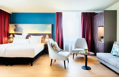 Ein Bett oder Betten in einem Zimmer der Unterkunft NYX Hotel Mannheim by Leonardo Hotels