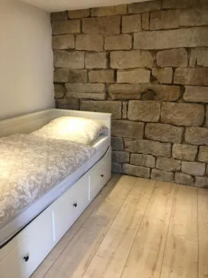Ein Bett oder Betten in einem Zimmer der Unterkunft Fritsch Häusel