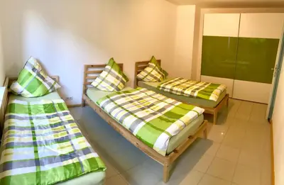 Ein Bett oder Betten in einem Zimmer der Unterkunft Ferienwohnung Sander