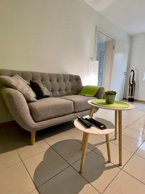 Ein Sitzbereich in der Unterkunft Ferienwohnung Sander