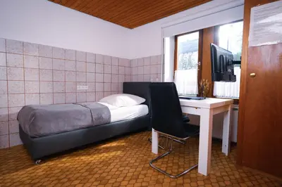 Ein Bett oder Betten in einem Zimmer der Unterkunft Einfache Unterkunft