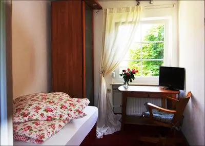 Ein Bett oder Betten in einem Zimmer der Unterkunft Hotel Herberge zur Traube