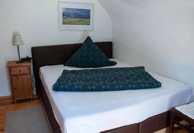 Ein Bett oder Betten in einem Zimmer der Unterkunft Hotel Herberge zur Traube