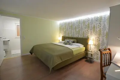 Ein Bett oder Betten in einem Zimmer der Unterkunft Gästehaus A und D Fischer