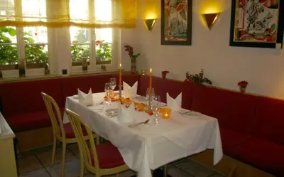 Ein Restaurant oder anderes Speiselokal in der Unterkunft Zum treuen Bartel