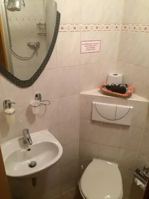 Ein Badezimmer in der Unterkunft Restaurant-Hotel Dimitra