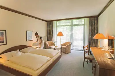 Ein Bett oder Betten in einem Zimmer der Unterkunft Häffner Bräu