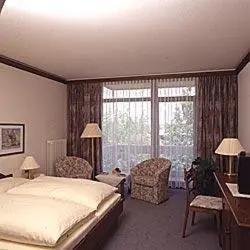 Ein Bett oder Betten in einem Zimmer der Unterkunft Häffner Bräu