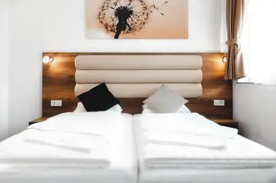 Ein Bett oder Betten in einem Zimmer der Unterkunft Hotel Castle Rastatt